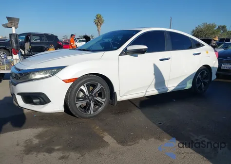 2016 Honda Civic Touring из США, поврежденный, VIN 2HGFC1F91GH656924